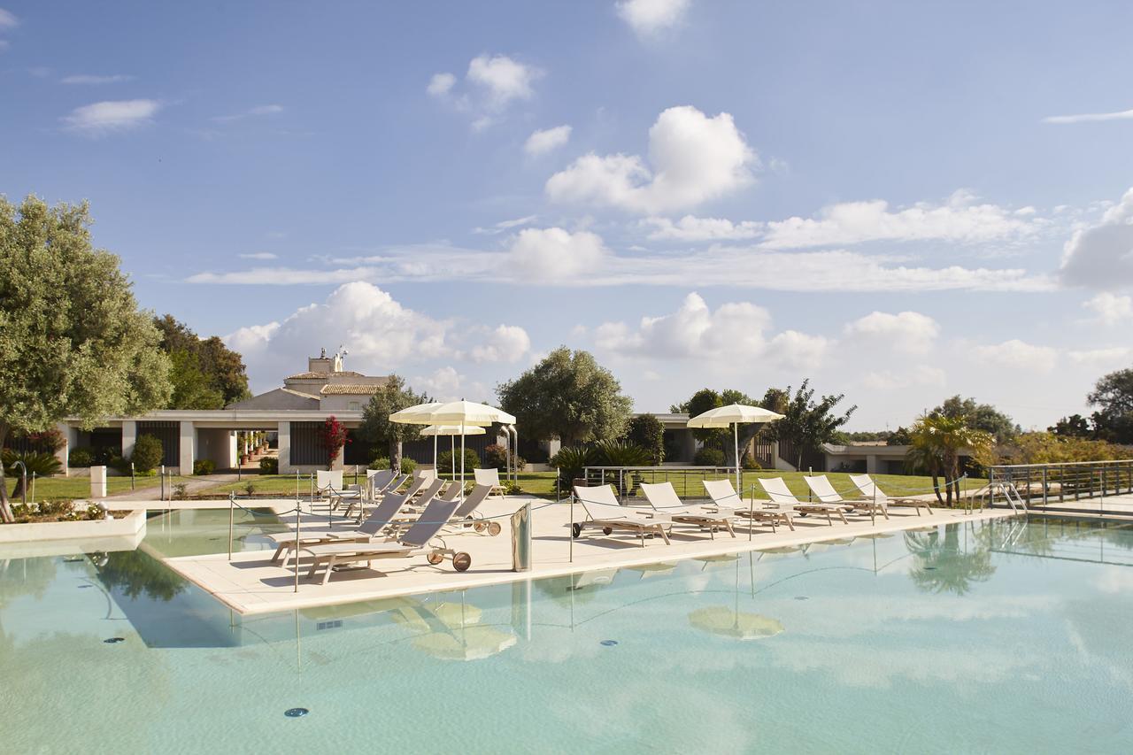 Borgo Di Luce I Monasteri Golf Resort & Spa Syracuse Exterior photo The swimming pool at the resort