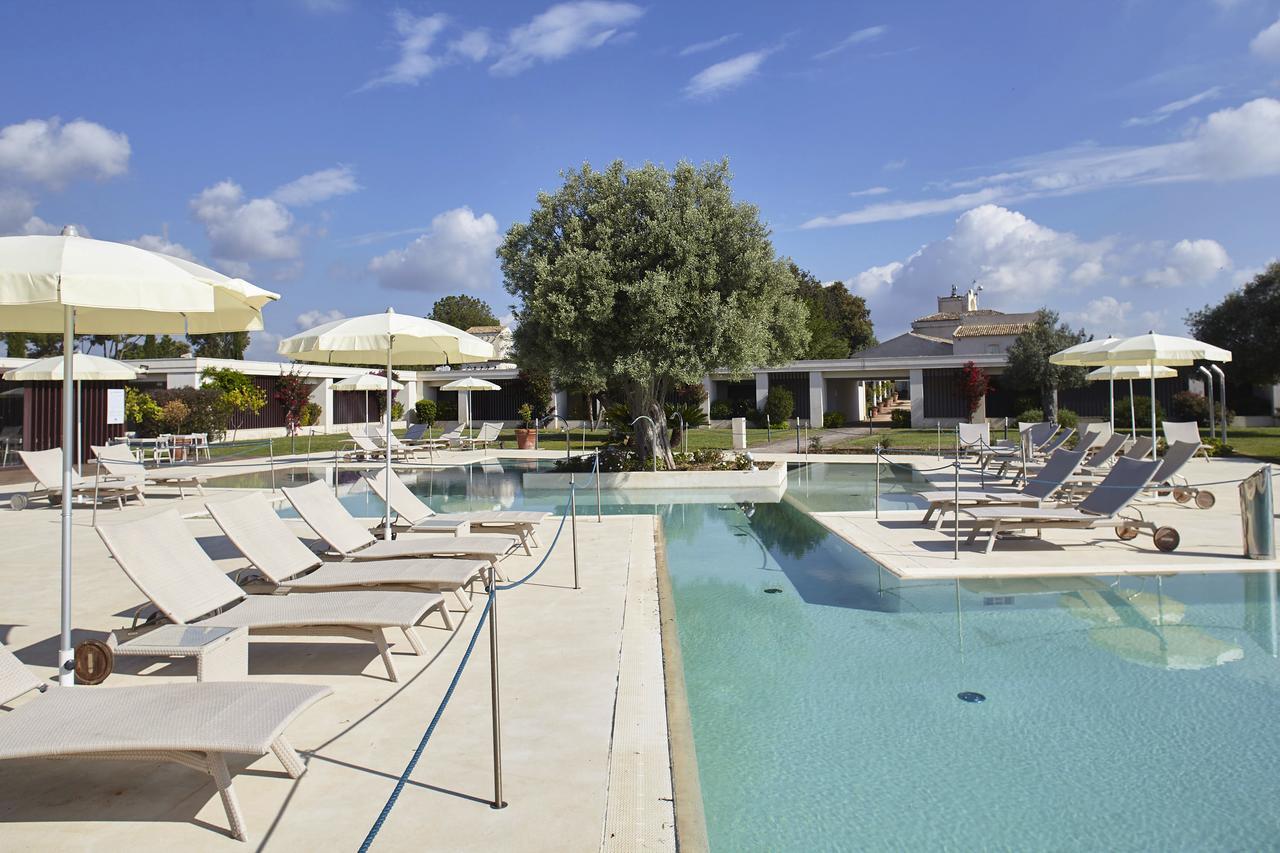 Borgo Di Luce I Monasteri Golf Resort & Spa Syracuse Exterior photo The swimming pool at the resort