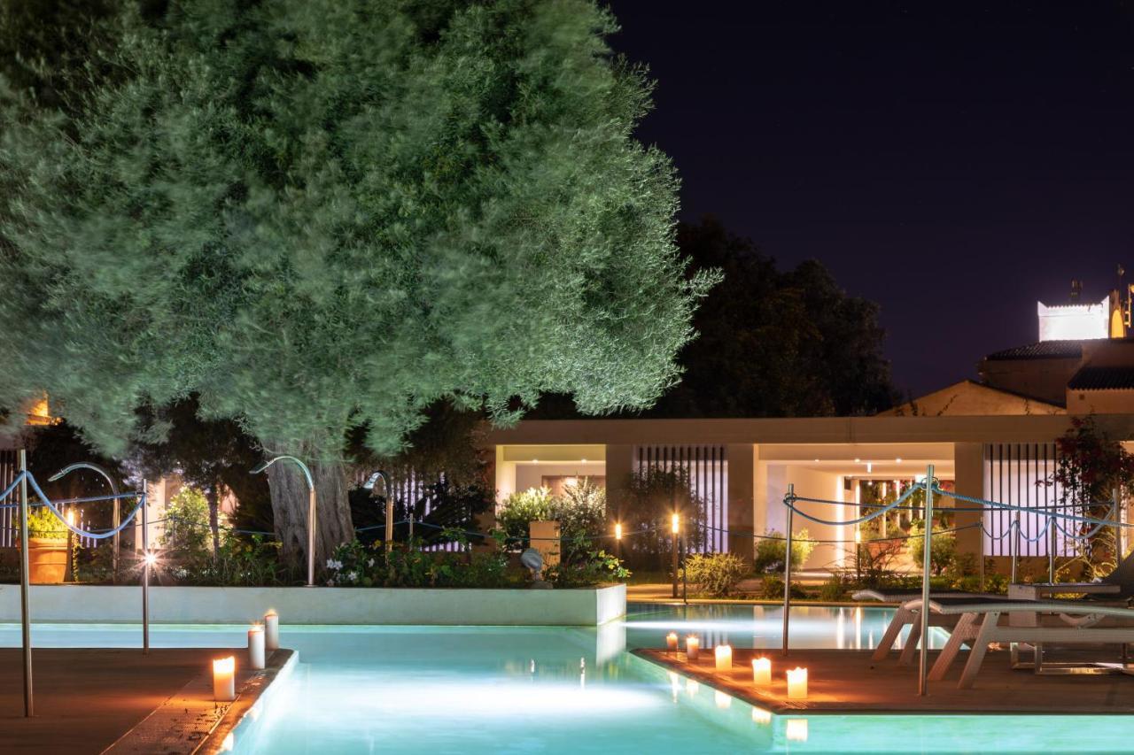 Borgo Di Luce I Monasteri Golf Resort & Spa Syracuse Exterior photo The hotel's pool