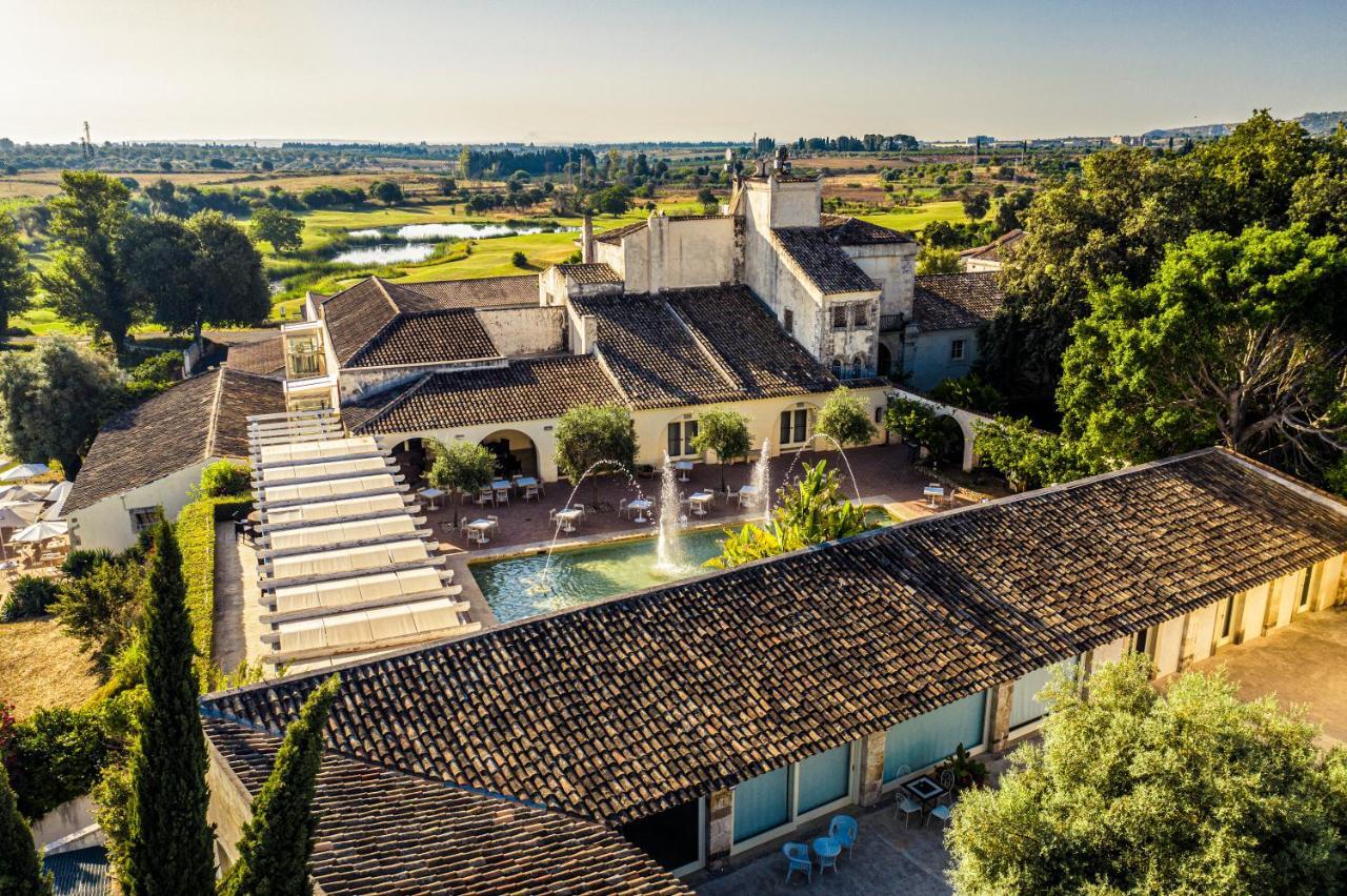 Borgo Di Luce I Monasteri Golf Resort & Spa Syracuse Exterior photo Aerial view of the hotel