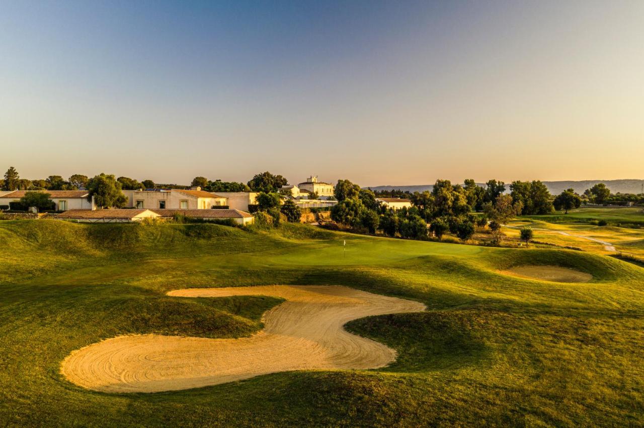 Borgo Di Luce I Monasteri Golf Resort & Spa Syracuse Exterior photo Golf course at the resort